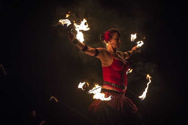 A fire dancer performs a solo act at the Blue Lake Havest Days. - MANUEL J. ORBEGOZO
