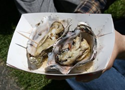 PHOTO BY BOB DORAN - a pair of grilled oysters from North Bay Shellfish