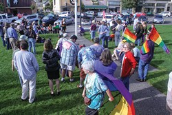 PHOTO BY KIMBERLY HODGES - About 70 people gathered on the Arcata Plaza to celebrate the Supreme Court rulings on DOMA and Proposition 8.