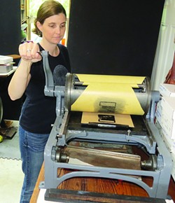 Artist and former Journal graphic designer Lynn Jones brings her vintage press to Eureka Books for demonstrations. (40)