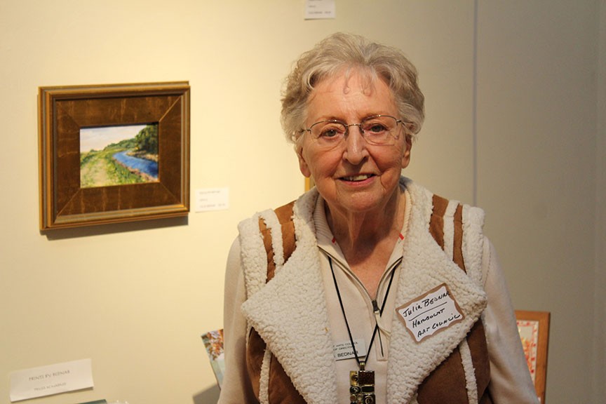 Artist Julia Bednar, a member of the board of the Humboldt Arts Council, celebrated her 80th birthday at a Eureka Chamber of Commerce mixer hosted by the council at Morris Graves Museum of Art on Thursday. - PHOTO BY BOB DORAN.