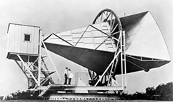 PHOTO COURTESY OF NASA - Bell Telephone Laboratories' horn antenna in Holmdel, New Jersey, with which Arno Penzias and Robert Wilson (shown in this 1965 photo) first detected the cosmic microwave background, thus providing the first hard evidence for the "big bang" paradigm.