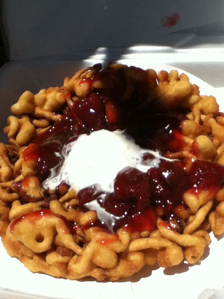 Carpe dough: strawberries and whipped cream on a funnel cake. - JENNIFER FUMIKO CAHILL
