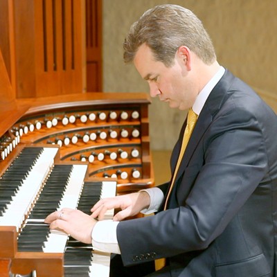 Ken Cowan at organ console