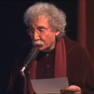 Jerry reciting poetry on the Playhouse stage.