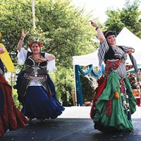 Kristie Alberti, Amanda Loftis and Megz Madrone of Tribal Oasis Belly Dance were among the scores of entertainers on Saturday, May 17, the first day of the Humboldt Arts Festival at Arcata's Creamery District.