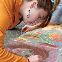 McKinleyville High School student Wendy Witte creates one of the pastel drawings on the school quad. Materials will be supplied for people who want to add their own bit of creativity during McKinleyville’s arts night.