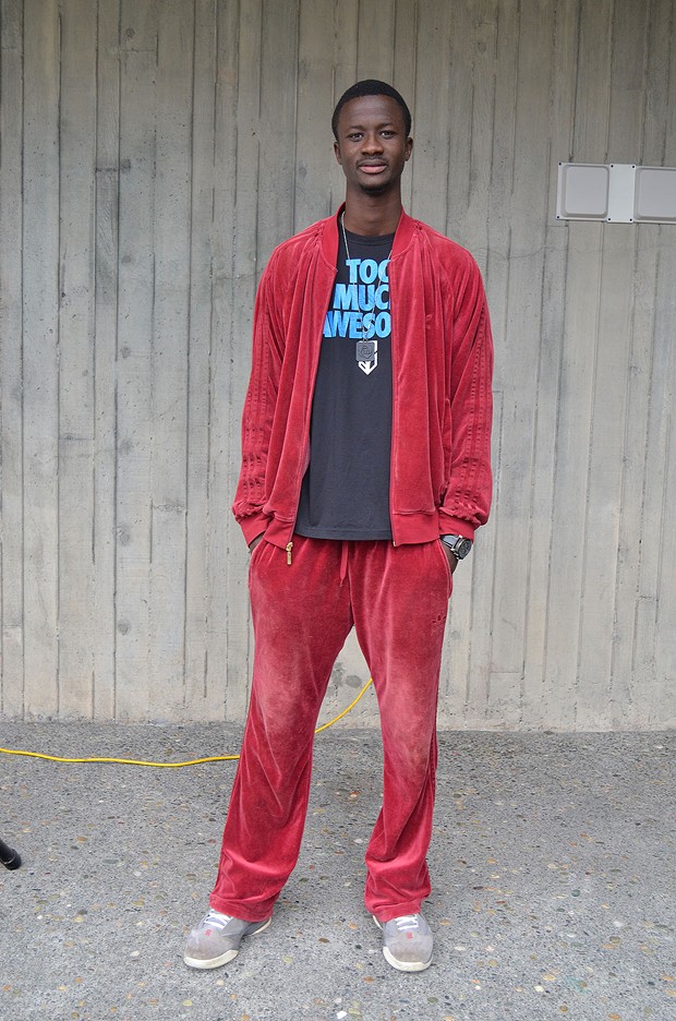 Moussa Sy, a freshman environmental engineering student is enjoying the cool climate here, a change from his home country of Mali. He's old-school in a velour tracksuit and Adidas. - PHOTO BY SHARON RUCHTE