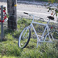 The "ghost bike" installed in 2008 on the side of State Route 299 where cyclist Greg Jennings was killed by a car that traveled onto the shoulder where he was riding.