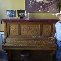 Oberon co-owner Roy Kohl won't let anyone play his upright grand piano in the Oberon Grill because of music licensing fees.