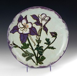 Otamay Hushing's plate full of columbines is at the Fire Arts gallery.