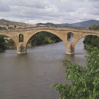 Puente La Reina marks the approximate western boundary of Spain's Basque Country (Euskal Herria). The bridge was built in the middle ages across the river Arga for Camino de Santiago pilgrims.