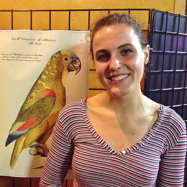 Samantha Herbert and a drawing of a parrot  by von Humboldt - BOB DORAN
