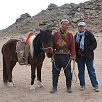 The artist with a Mongolian Herder, who wouldn't be pictured without his horse.