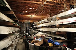 PHOTO BY ZACH ST. GEORGE - The Humboldt Bay Rowing Association Boathouse, near the Samoa Bridge. The HSU men and women's team share the space with the Humboldt Bay Rowing Association until the women move after the completion of the dock at the Humboldt Bay Aquatic Center.