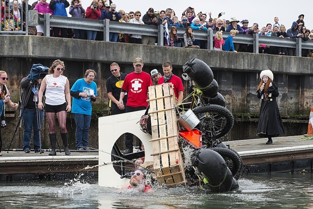 The Moonshine Banditos capsize shortly after entering Humboldt Bay during the second day of the 2015 Kinetic Grand Championship. - MARK MCKENNA
