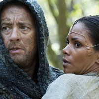 Tom Hanks and Halle Berry look concerned in Cloud Atlas.