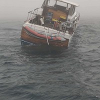 Coast Guard Rescues Two From Boat