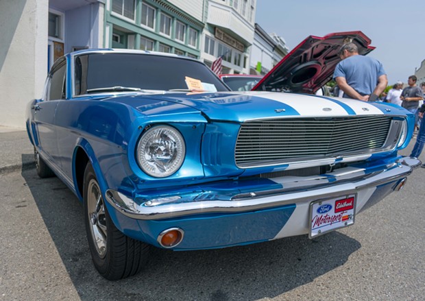 Josua DeGraw's 1966 Class 2B blue Mustang glistens in the sun on Main Street on July 28 at the Fortuna Redwood AutoXpo. - PHOTO BY MEGAN BENDER