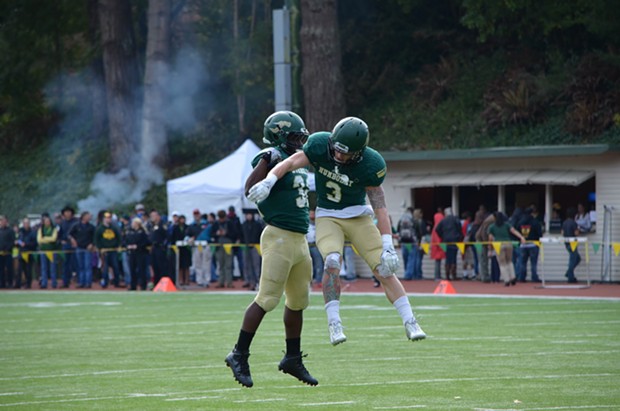 Wide receiver Chase Krivashei and tailback Ja'Quan Gardner celebrate a touchdown in 2015. - FILE