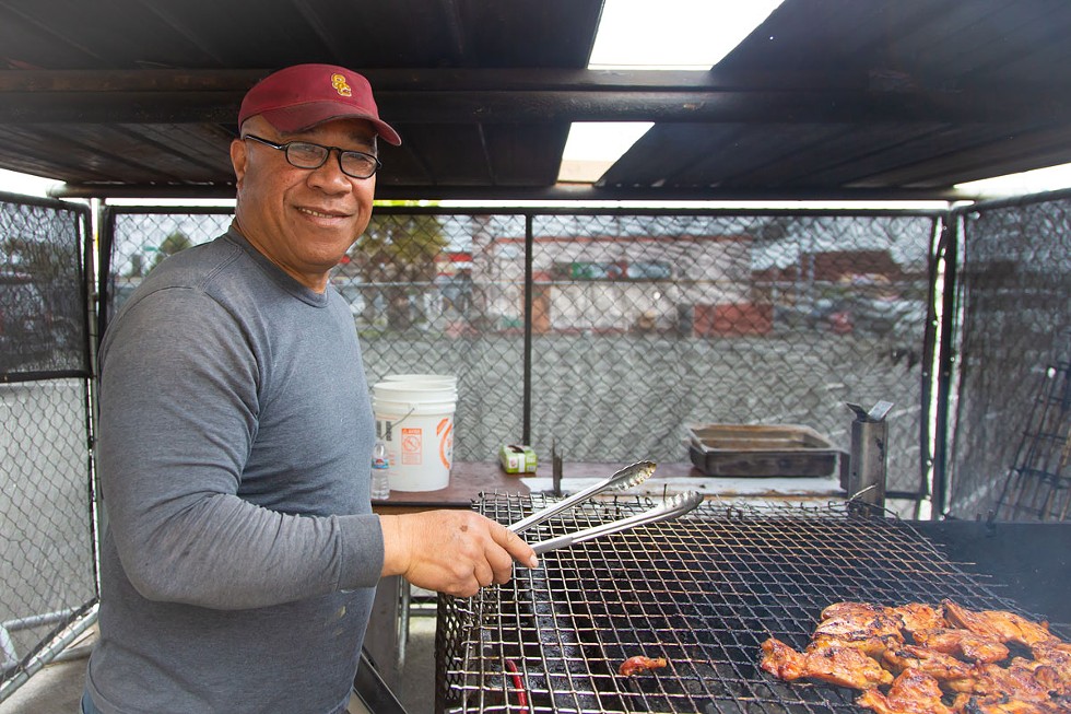 Sammy’s dad at the grill. - AMY KUMLER