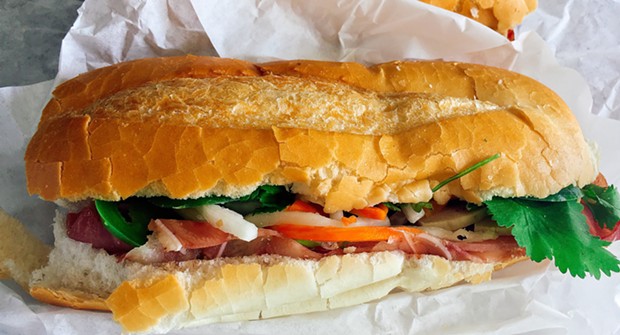 The bành mí (aka khao chī) sandwich you can only get on Saturdays — if you're quick. - PHOTO BY JENNIFER FUMIKO CAHILL