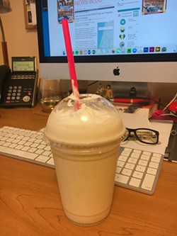 A milkshake delivered from Ultimate Yogurt to the Journal office via Uber Eats. - PHOTO BY JENNIFER FUMIKO CAHILL