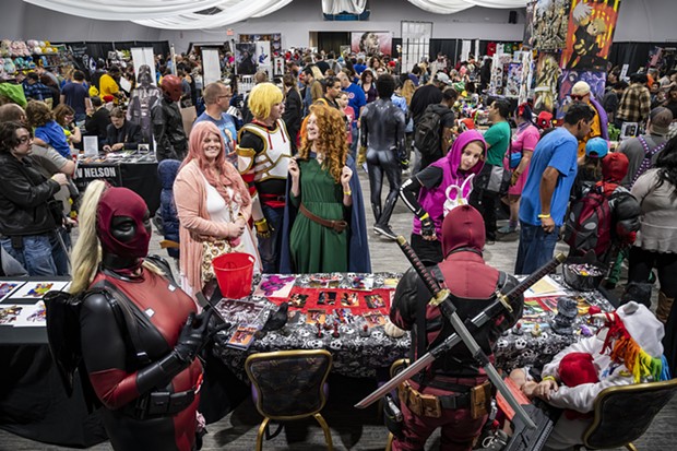 A large crowd of attendees wandered through a mix of vendors and featured artists at Ohana Comic Con. - PHOTO BY MARK LARSON