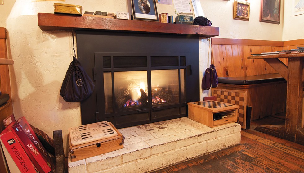 Stay warm and cozy with Cafe Mokka’s hot tubs and fireplace. - DREW HYLAND