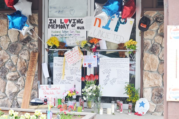 Tributes left at the Dueys' grocery, Ted and JoAnn's, after Ted Duey's death. - COURTESY OF THE DUEY FAMILY