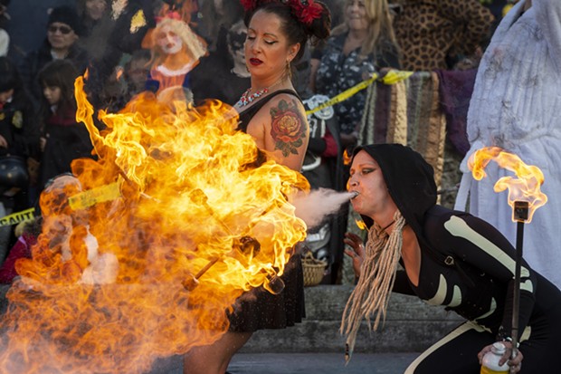 The Bella Vita Fire Dance Company burns it up on the Arcata Plaza. - PHOTO BY MARK LARSON