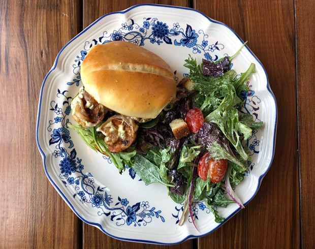 The shrimp po' boy with remoulade and salad. - PHOTO BY JENNIFER FUMIKO CAHILL