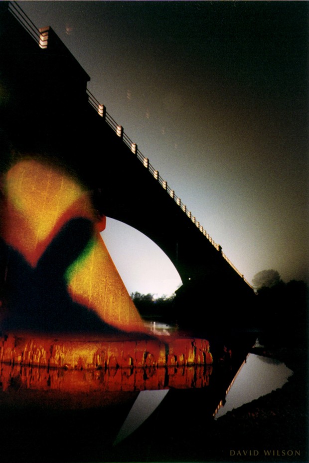 “Shadow of Himslef.” The eerie shadow of the creature spread across one of Fernbridge’s giant supports. Fernbridge, Humboldt County, California. 1997. - PHOTO BY DAVID WILSON