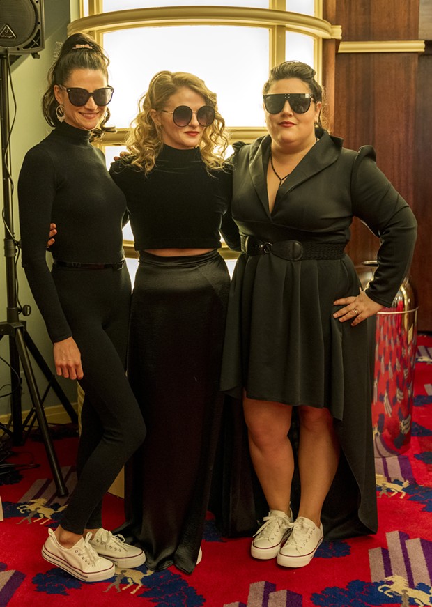 Jessica King, Carly Robbins and Klark Swan dressed for an action movie we would absolutely watch. - PHOTO BY ZACH LATHOURIS