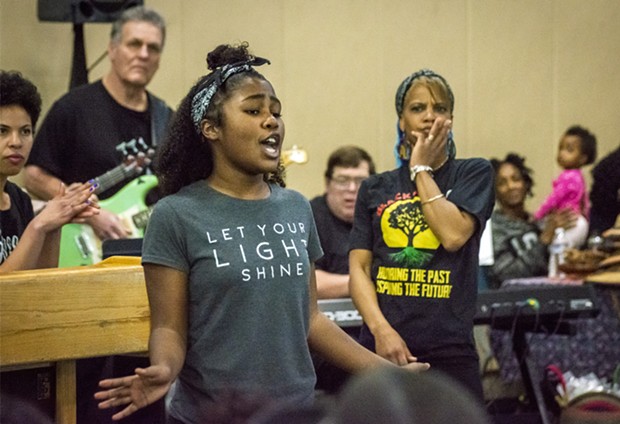 January – A soloist in the Healing and Compassion Spiritual Singers and Black Empowerment Dance Troupe helped close the Martin Luther King Birthday event in Eureka, with group director Valetta Molofsky looking on. - PHOTO BY MARK LARSON