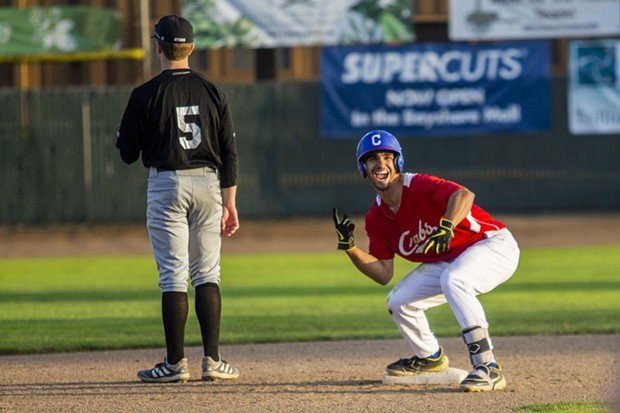 Crabs outfielder Tyler Ganus (#34) celebrates looking back at the dugout with his teammates after hitting a double on June 19, 2021, against the Seattle Studs at Arcata Ballpark. - THOMAS LAL