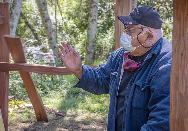"My favorite part of the project has been watching the boys do the work," said Walt Lara Sr, while photographed at the Sue-meg Village restoration project in May "They're a pretty good crew and it's important that traditional people are here doing it." - PHOTO BY MARK A. LARSON