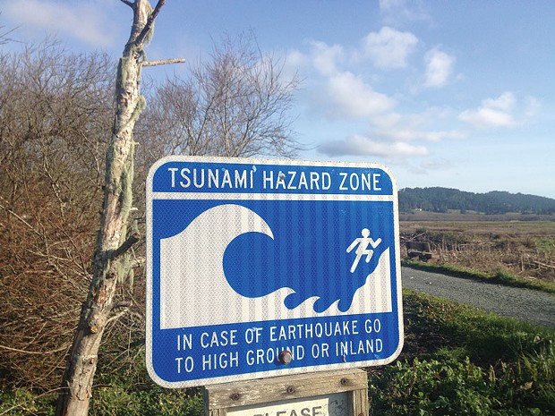 Tsunami warning sign. - FILE