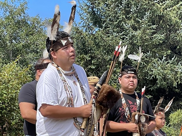 William Frank IV leads Wiyot youth wearing ceremonial regalia in a brush dance. - PHOTO BY JENNIFER SAVAGE