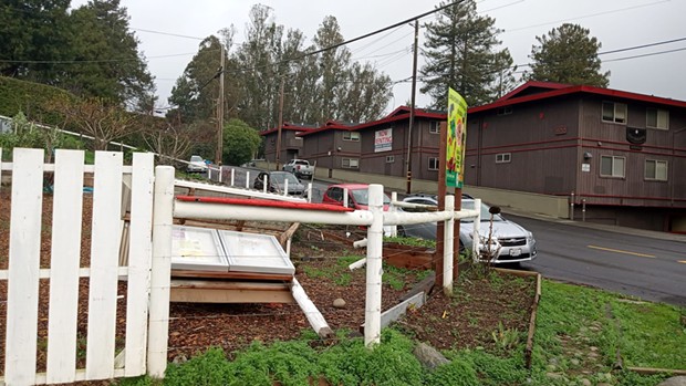 The Centro del Pueblo's Jardin Santuario's welcome sign and bulletin board had been found knocked down on Tuesday, Dec. 27. - SUBMITTED