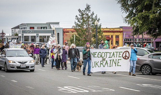 The march after the peace rally for Ukraine on Saturday. - PHOTOS BY MARK LARSON