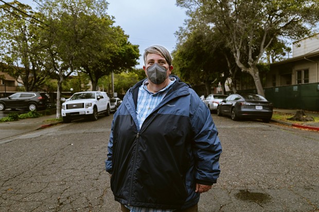 Beth Kenny, at Crab Cove in Alameda, Calif., on April 8th, 2023. Kenny, who is immunocompromised, says dropping masking requirements in health care is “devastating.” Tests show their body is unable to produce COVID-19 antibodies despite vaccination. - PHOTO BY FELIX URIBE FOR CALMATTERS