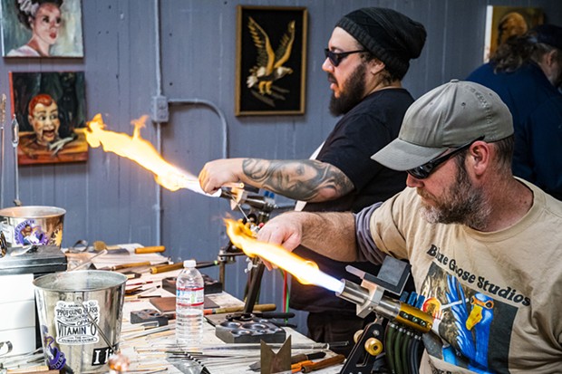 Marble Weekend featured live “torch working” and marble-making by local glass artists including Marcose Walton (left), of Eureka, and Matt Kelley, of Willow Creek, on Saturday at the Glass Garage. - PHOTO BY MARK LARSON