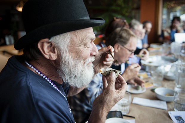 James Smith savors a contender during the Best Raw Oyster, Best Cooked Oyster and Best Non-oyster  judging. - MARK MCKENNA