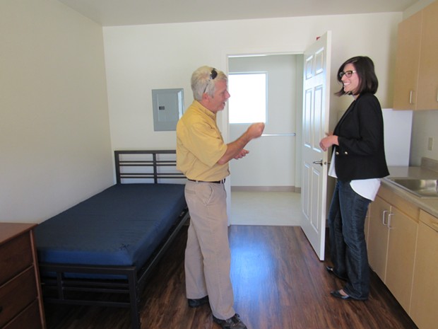 County Supervisor Mark Lovelace and Arcata City Councilmember Sofia Pereira check out the interior of one of the new apartments. - LINDA STANSBERRY