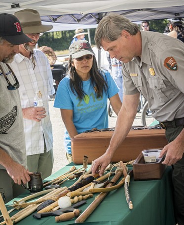 Dale Webster, a Redwood National Park employee and Yurok tribal member, displayed several of his handcrafted traditional items. - MARK LARSON