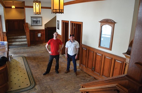 McKinlay and Neff in the Minor lobby during renovations. - FILE