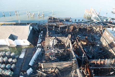 An overhead view of the remains of the commercial building. - MARK MCKENNA