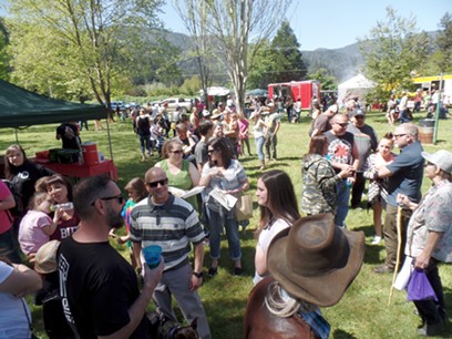 The crowds lined up to meet the Bigfoot hunters at the fest. - CHRISTIAN PENNINGTON