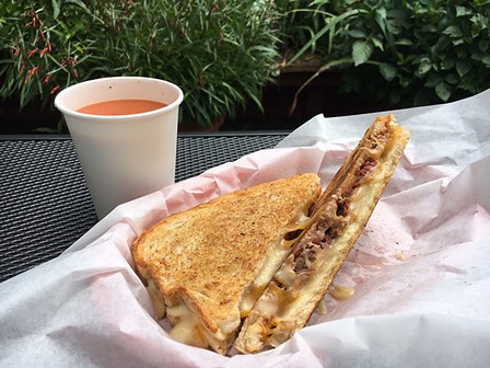 Brisket grilled cheese in the garden. - JENNIFER FUMIKO CAHILL